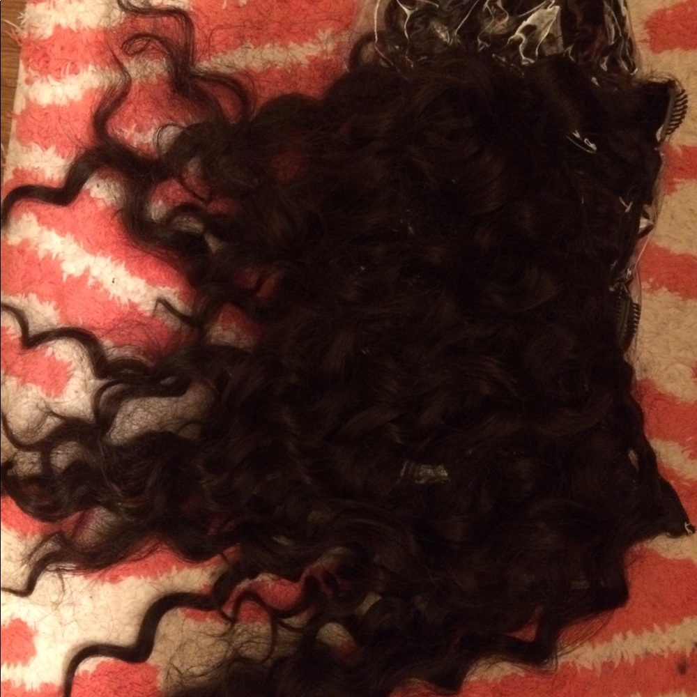 Permed weave with clips